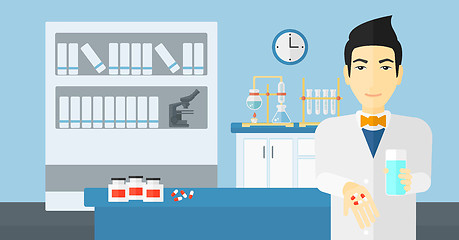 Image showing Pharmacist giving pills.