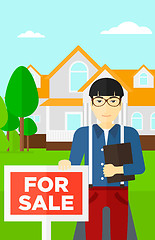 Image showing Real estate agent offering house.