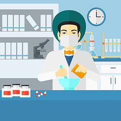 Image showing Pharmacist preparing medicine.