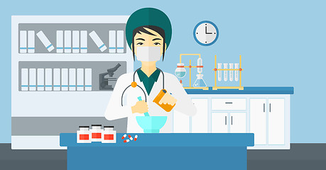 Image showing Pharmacist preparing medicine.