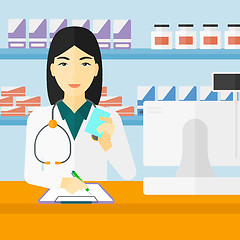 Image showing Pharmacist taking notes.