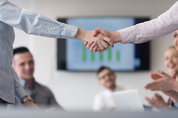 Image showing business womans handshake