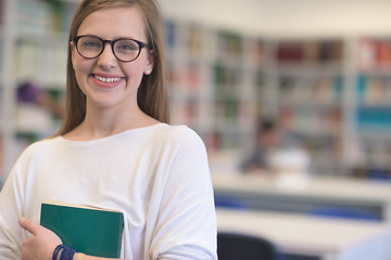 Image showing portrait of female student in library