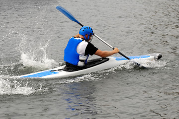 Image showing Man racing in kayak