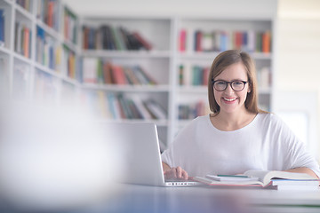 Image showing female student study in school library