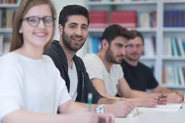 Image showing group of students study together in classroom