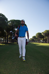 Image showing golf player walking