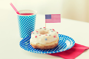 Image showing donut with juice and american flag decoration