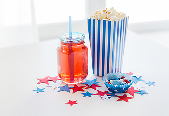 Image showing drink and popcorn with candies on independence day