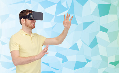 Image showing happy man in virtual reality headset or 3d glasses