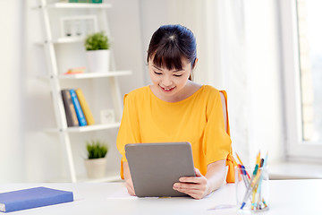 Image showing asian woman student with tablet pc at home