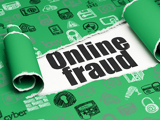 Image showing Security concept: black text Online Fraud under the piece of  torn paper