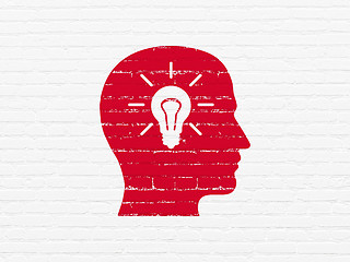 Image showing Education concept: Head With Light Bulb on wall background