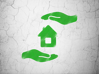 Image showing Insurance concept: House And Palm on wall background