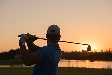 Image showing golfer hitting long shot