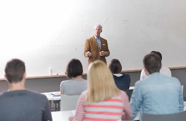 Image showing teacher with a group of students in classroom