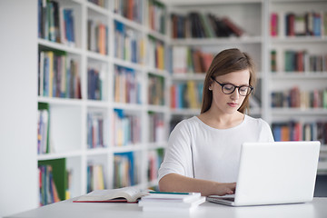 Image showing female student study in school library