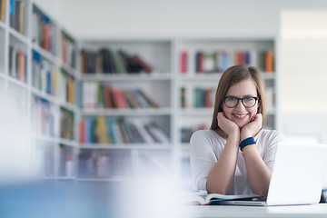 Image showing female student study in school library