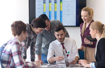 Image showing young business people group on meeting at modern office