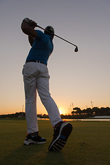 Image showing golfer hitting long shot