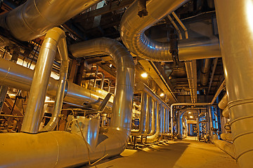 Image showing Equipment, cables and piping as found inside of a modern industr