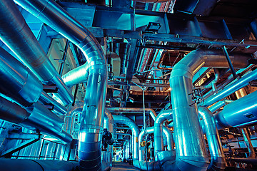 Image showing Equipment, cables and piping as found inside of a modern industr