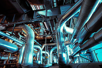 Image showing Equipment, cables and piping as found inside of a modern industr