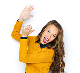 Image showing happy young woman or teen girl applauding