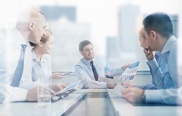 Image showing group of smiling businesspeople meeting in office