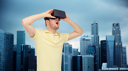 Image showing happy man in virtual reality headset or 3d glasses