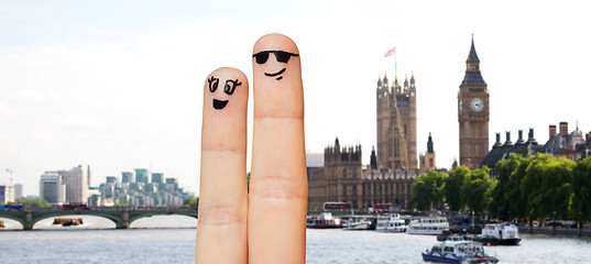 Image showing close up of two fingers with smiley faces