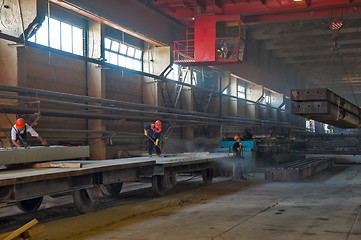 Image showing Worker cleans railway platform