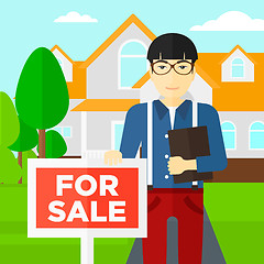 Image showing Real estate agent offering house.