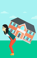 Image showing Woman carrying house.