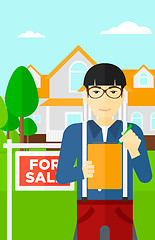 Image showing Real estate agent signing contract.