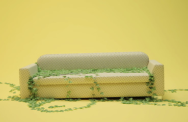 Image showing yellow broken sofa