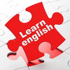 Image showing Studying concept: Learn English on puzzle background