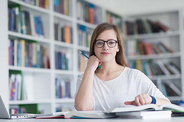 Image showing female student study in school library