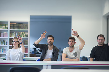 Image showing group of students  raise hands up