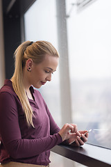 Image showing business woman using smart phone at office