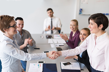 Image showing business womans handshake