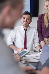 Image showing young business people group on meeting at modern office