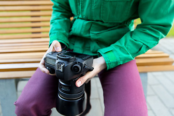 Image showing close up of male photographer with digital camera