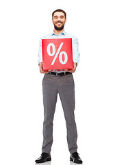 Image showing smiling man with red shopping bag