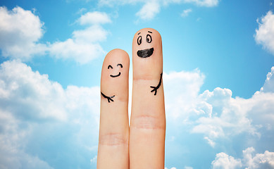 Image showing close up of two fingers with smiley faces