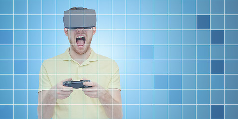 Image showing angry man in virtual reality headset with gamepad