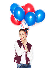 Image showing happy teenage girl with helium balloons