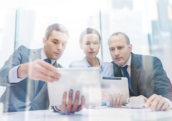 Image showing business team with tablet pc having discussion