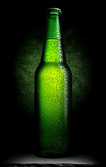 Image showing Green beer on black