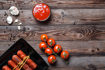 Image showing Sausage roasted on the grill.